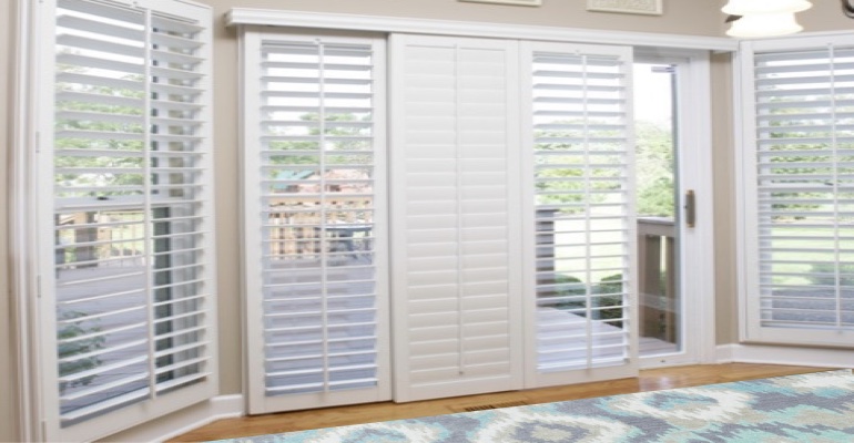 [Polywood|Plantation|Interior ]211] shutters on a sliding glass door in Denver